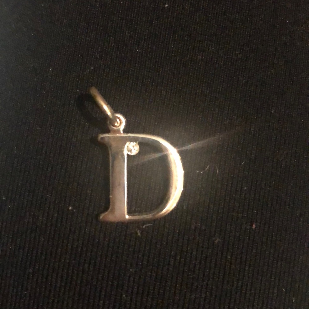 Dior D charm with Crystal.  Delicate.  Plated